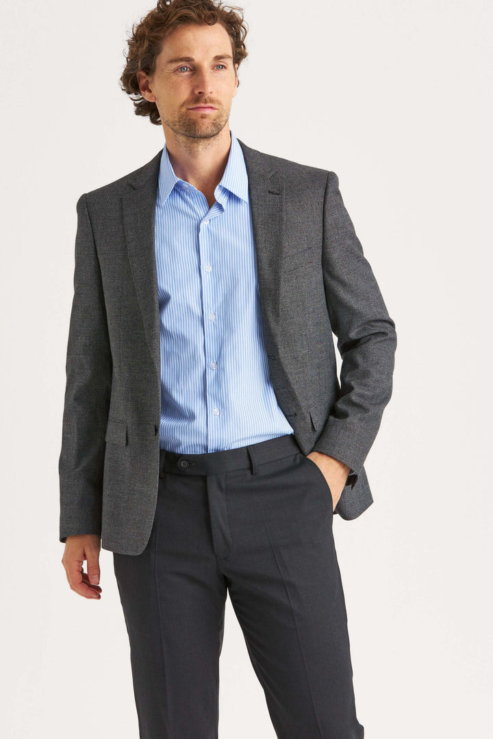 Mörkgrå kostymbyxor i ullstretch, grå kavaj