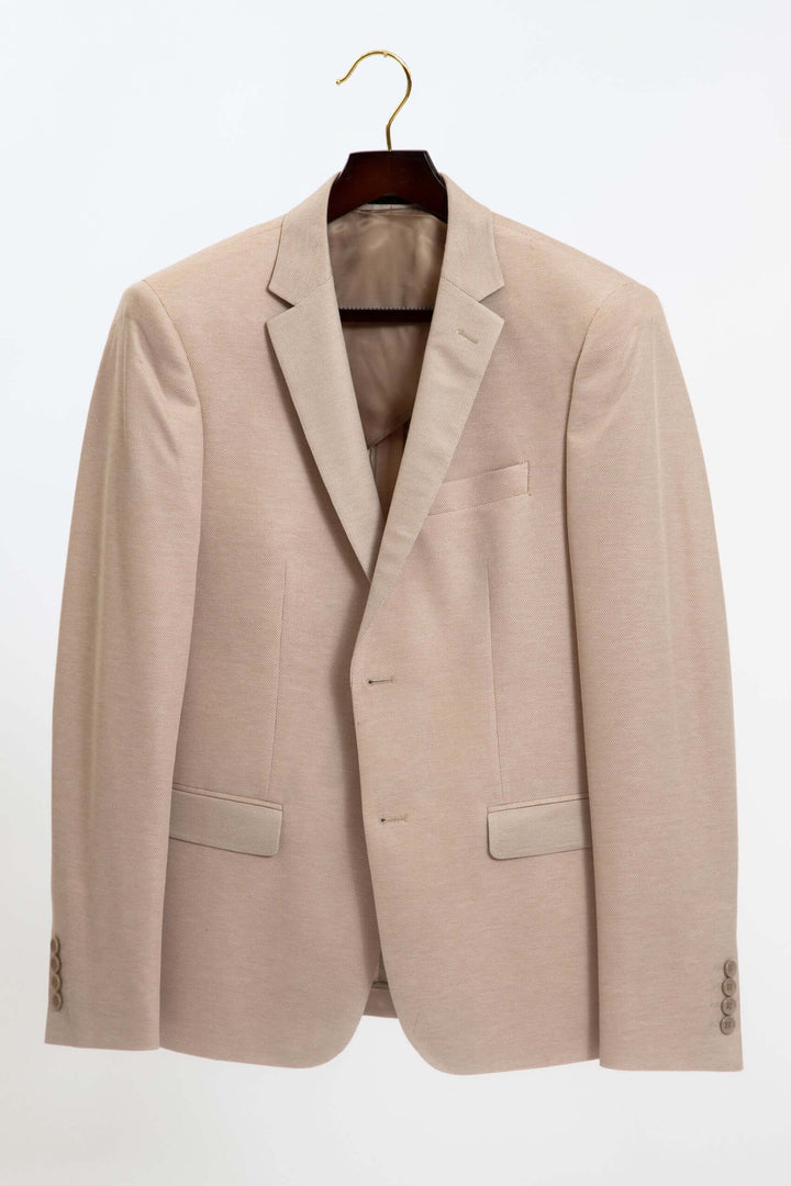 Beige kavaj med mikromönster