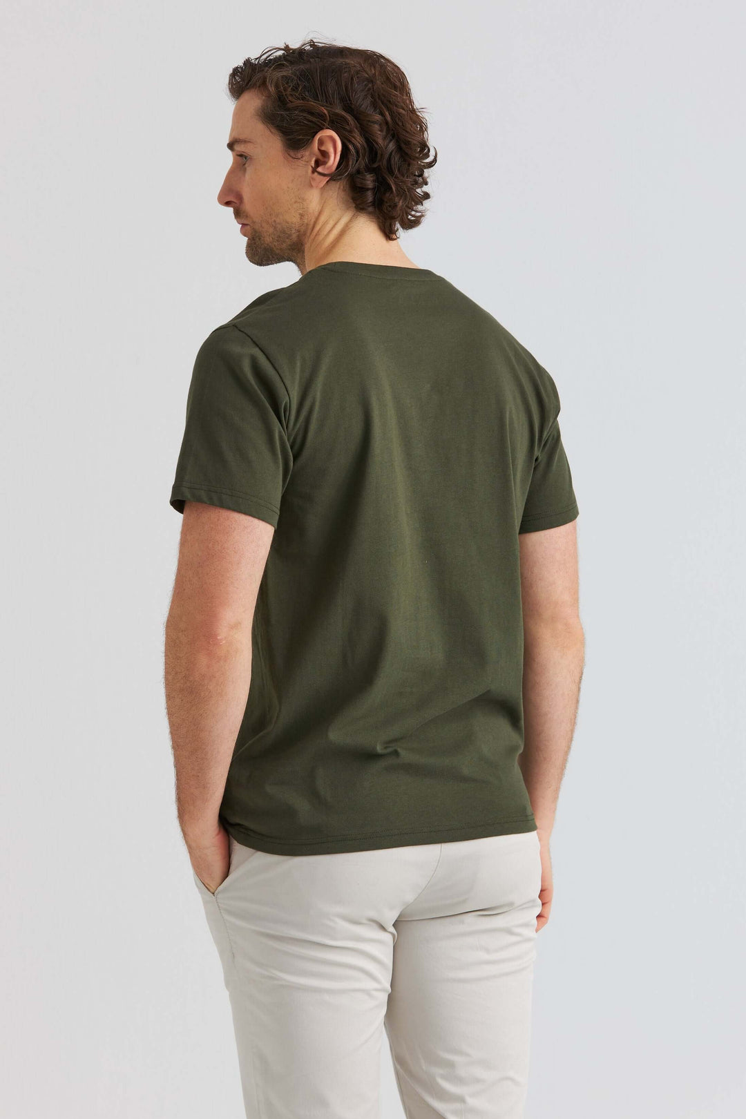 Core T-shirt Grön bakifrån, visande grön färg och enkel design, perfekt för avslappnad stil.