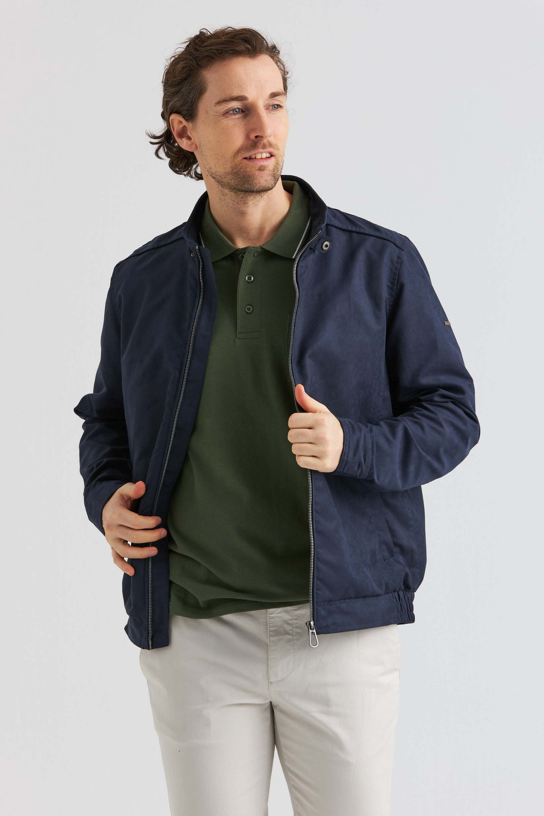 Marinblå Jacka i Soft Suede av hög kvalitet, sportig design med blixtlås och stilren look.
