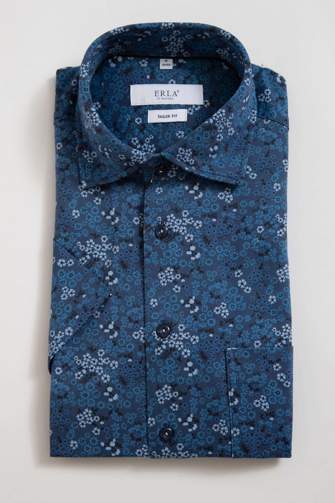 Blå kortärmad skjorta med blommönster