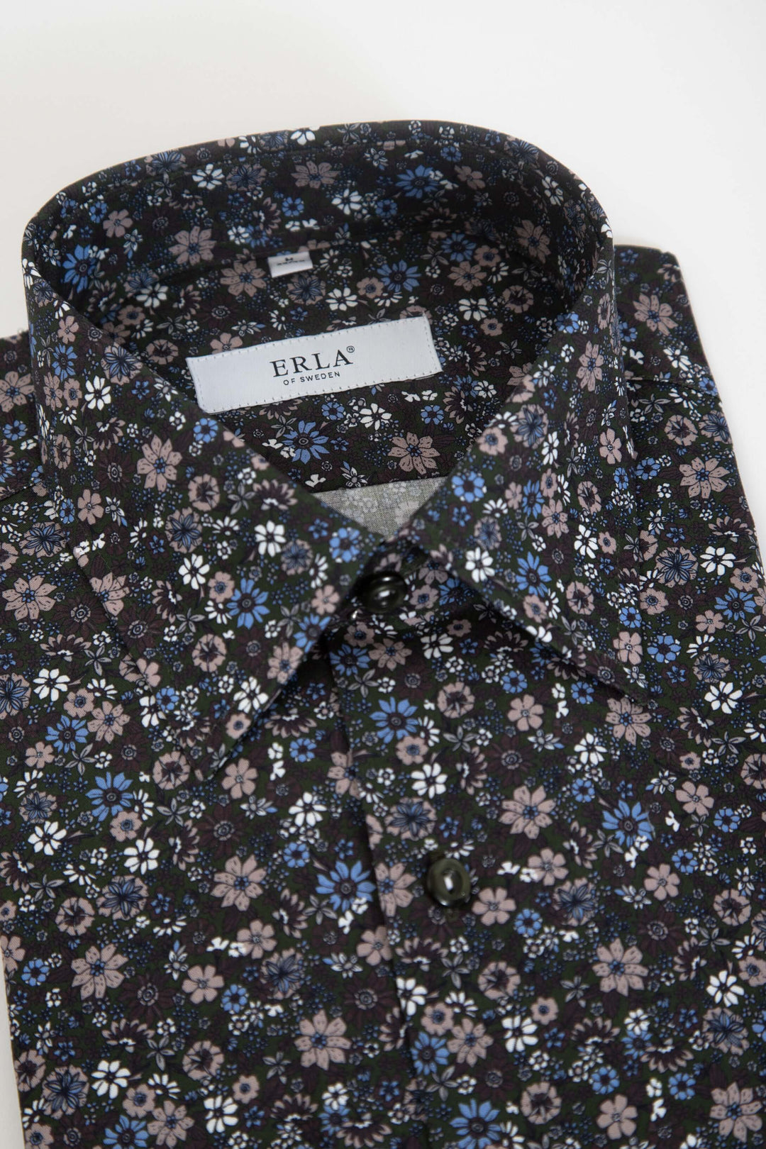 Mörkgrön skjorta med blommigt print