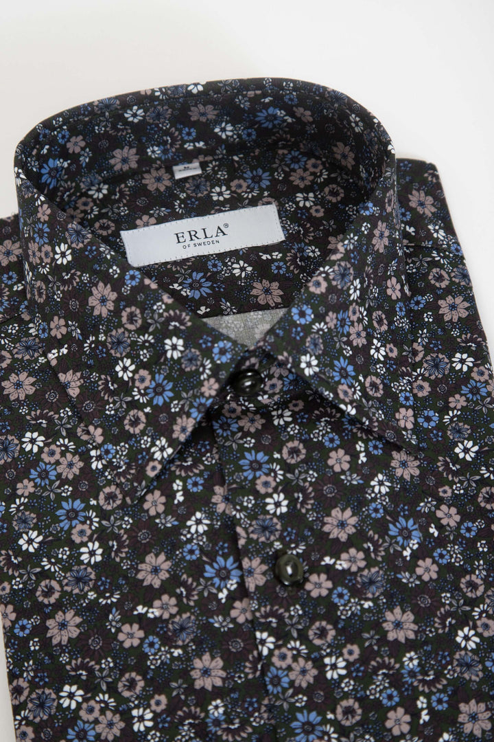 Mörkgrön skjorta med blommigt print
